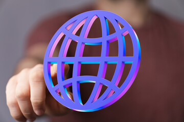 Abstract image of a hand interacting with a vibrant 3D globe icon, symbolizing global connection...