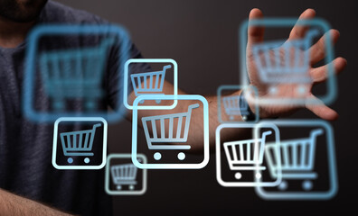 Person interacts with virtual shopping carts, showcasing online shopping, e-commerce, digital...
