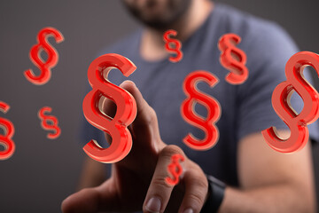 Abstract 3D rendering of red paragraph symbols. Perfect for legal, law, and justice concepts.