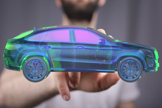 Person interacting with a 3D model of a car, showcasing automotive technology.