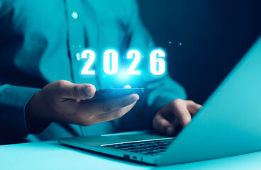 Businessman holds the growth and development of the company in 2026. Business, Marketing, Happy New Year 2026.