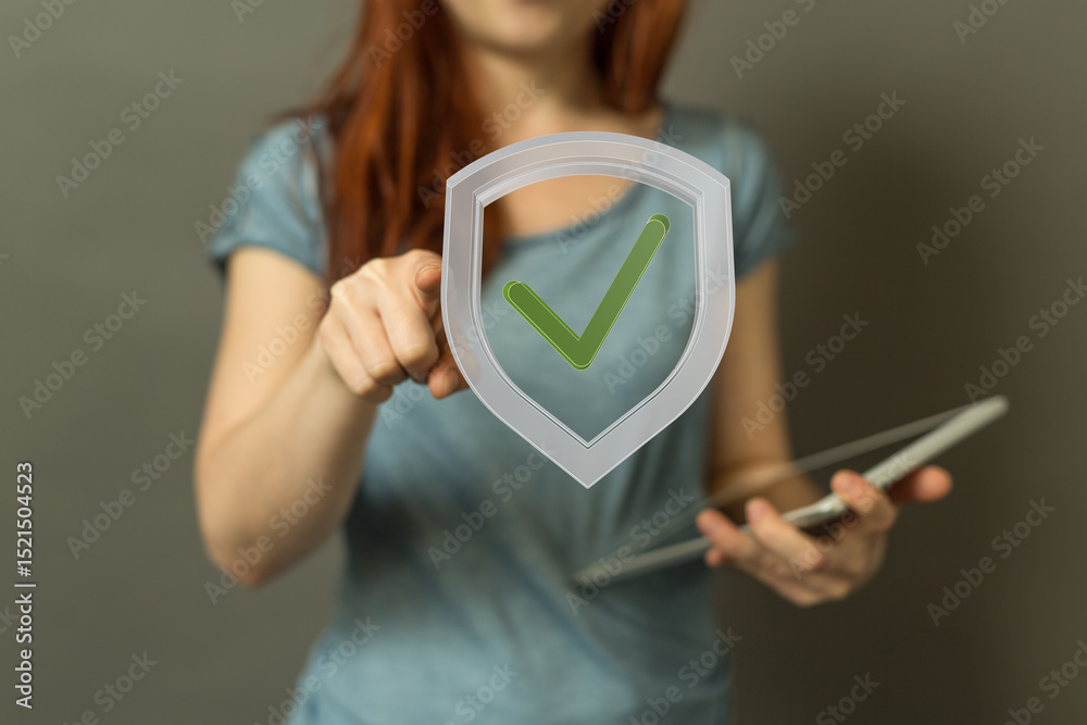 Poster image of a woman indicating a digital shield with a check mark, representing security, protection, a