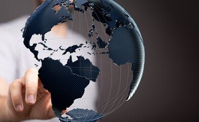High-quality stock photo of a hand interacting with a 3D model of the Earth, symbolizing global...