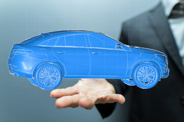 A businessman presents a digital car model.  Automotive design, innovation.