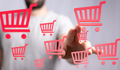 Person interacting with virtual shopping carts, representing online shopping and e-commerce.