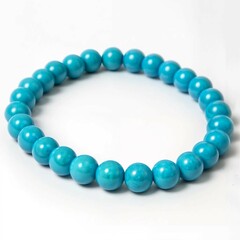 turquoise bracelet made of round beads on a white background