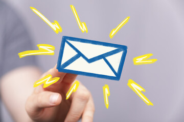 Image of a finger pressing a virtual email envelope.  Perfect for email marketing, communication,...