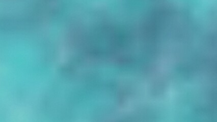 A softly blurred background image featuring a blend of teal and blue hues. The texture is smooth with subtle variations in shade.