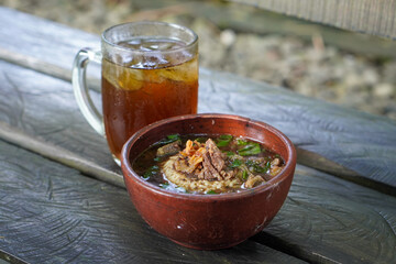 Rawon, Indonesia, captured on June 9, 2025. A traditional Indonesian beef soup made with rich black broth from keluak nuts, served with rice, bean sprouts, and salted egg.