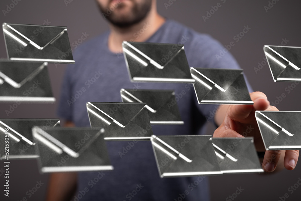 Poster Stock photo of a man interacting with a digital interface showing multiple email icons.
