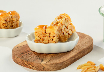 Premium baklava with pine nuts, luxurious Arabic Middle Eastern dessert for hospitality and happy...