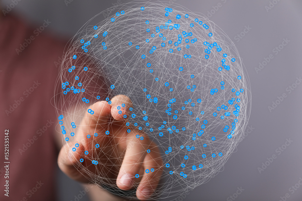 Leinwandbilder Abstract image of a hand interacting with a digital sphere representing global network connections.