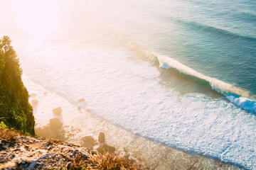 Ocean landscape with waves and rocks and sunshine