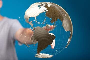High-quality stock photo of a hand interacting with a digital globe, representing global...