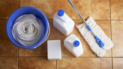 Neatly arranged cleaning supplies with mop and bucket, showcasing professional janitorial organization and efficiency.