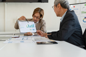 Fototapeta premium Senior businessmen analyzing data.