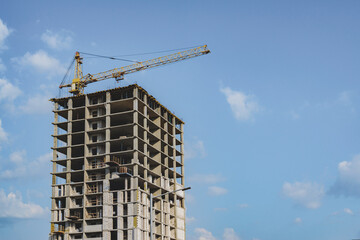 High-Rise Building Under Construction with Tower Crane