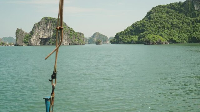 Close Up of a Boat Sailing Through Ha Long Bays Limestone Islands