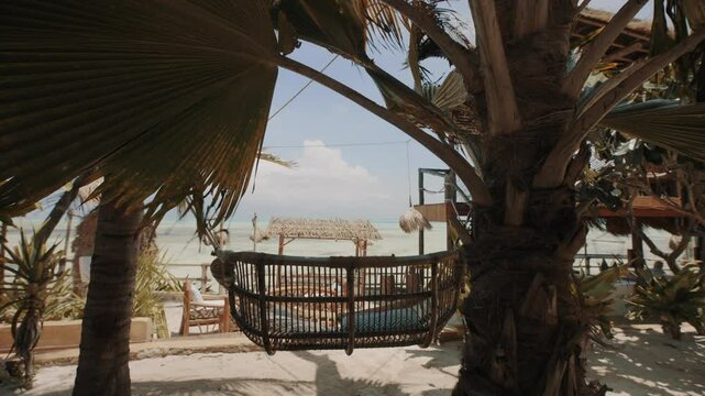 Shot of beach club hammock seat in Zanzibar.