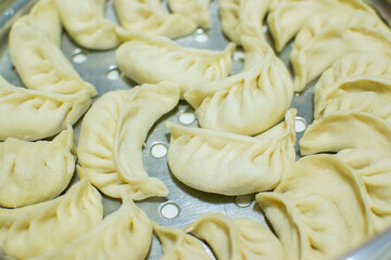 Close up of Momo, type of South Asian dumpling; native to Tibet, Nepal, Bhutan and Sikkim. It is...