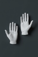 Exploring the delicate elegance of sculpted hands against a minimalist backdrop showcasing artistry and craftsmanship