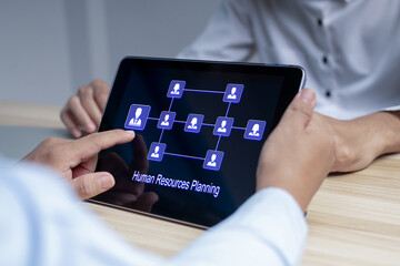 human resource planning diagram on digital mobile tablet computer in meeting room at office, human resource management, job interview, business marketing, work recruitment, job applicant concept