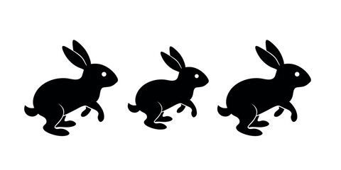 Three black running rabbit silhouettes in a row