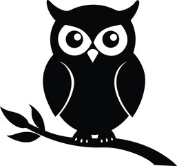 owl sitting on branch