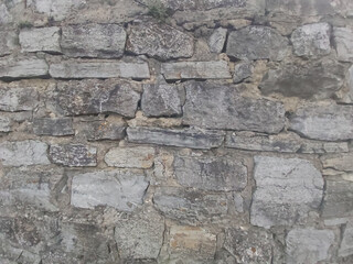 background wall masonry of old gray stone