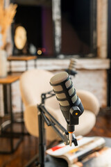 Engaging podcast setup with microphones and comfortable seating for lively discussions in a modern studio