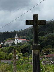 cross on the hill close to the village