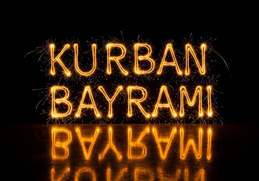 Kurban bayrami text made of sparklers glow
