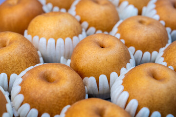 packaged pears on sale at the market