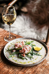 An Elegant Seafood Plate beautifully paired with White Wine and