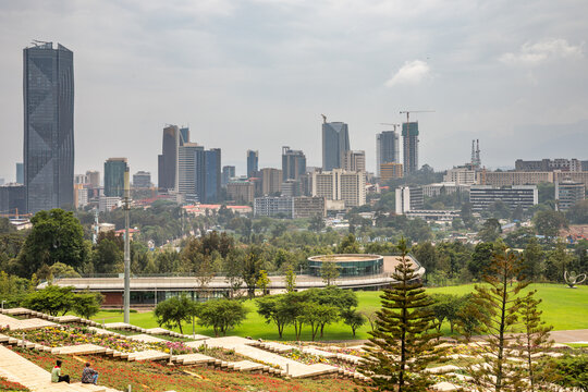 Rapid development of central business district with modern skyscrapers of downtown of Addis Ababa and green park in the foreground, Ethiopia