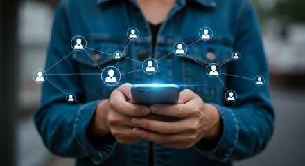 Person holding smartphone with connected network of users representing online social connections