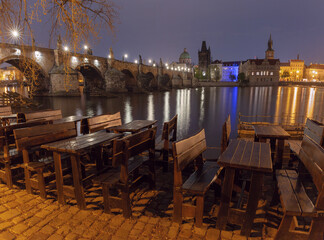 Charles Bridge over Vltava River at night in Prague, Czech Republic