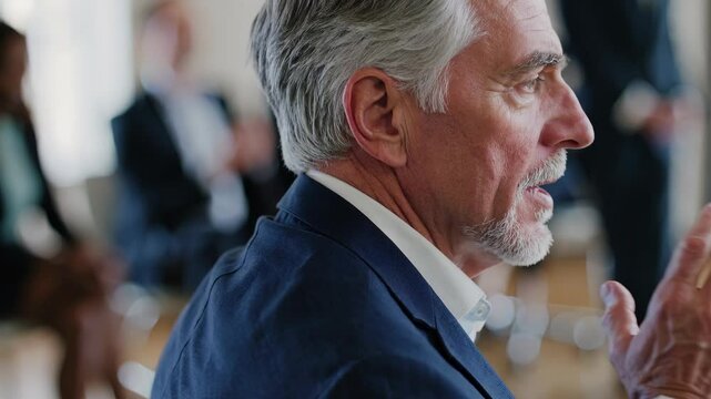 Corporate teamwork around businessman project. Team listens during corporate meeting. Businessman talks to teamwork group. Office teamwork shows corporate collaboration in progress.