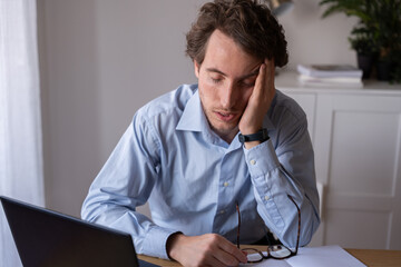 Employee working under stress and sleep deprivation