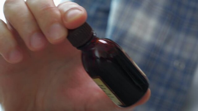 iodine in a dark container close-up.
Antibacterial liquid for wound healing.
Medical iodine