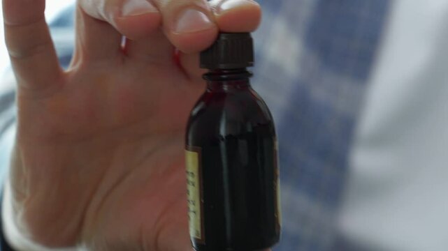 iodine in a dark container close-up.
Antibacterial liquid for wound healing.
Medical iodine
