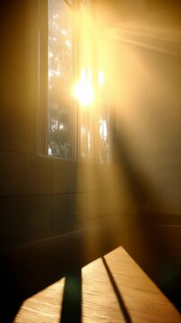 Sunlight Streams Through Window Illuminating Room Casting Rays and Shadows Creating Warm Atmosphere