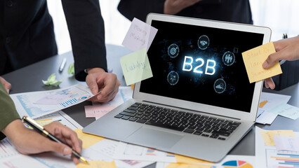 Business person navigates B2B landscape, harness technology to enhance business-to-business...