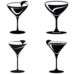Four Black and White Martini Glasses with Garnishes on a White Background