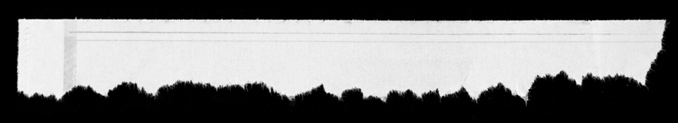 Torn paper on black