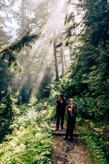 Family hiking at Glacier National Park, Canadian Rockies. British Columbia, Canada