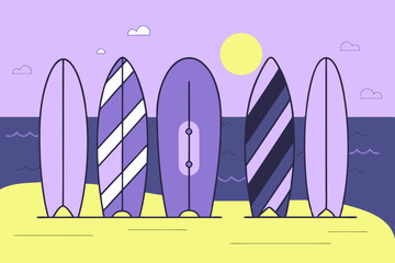 Colorful surfboards standing on the beach at sunset 