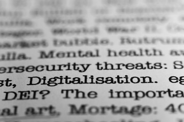 Digitalisation. Text printed on a page. A piece of paper with a phrase written in retro typewriter...