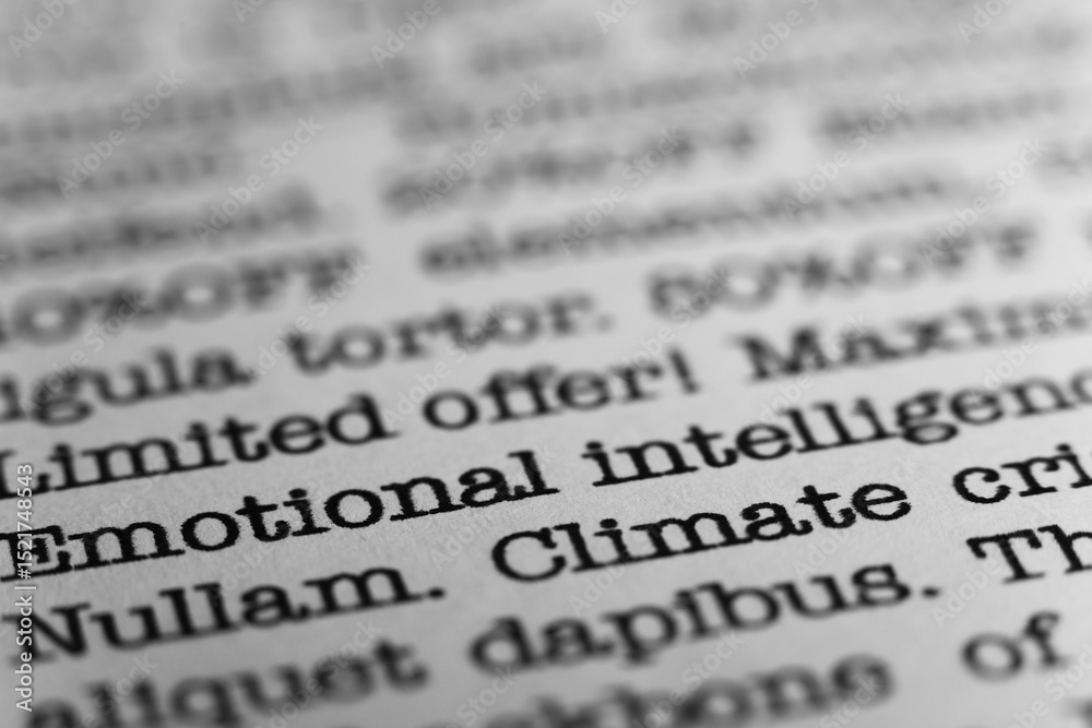 Fototapete emotional intelligence. text printed on a page. a piece of paper with a phrase written in retro type