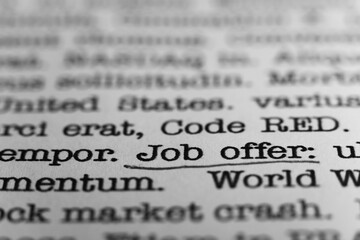 Job offer. Text printed on a page. A piece of paper with a phrase written in retro typewriter font